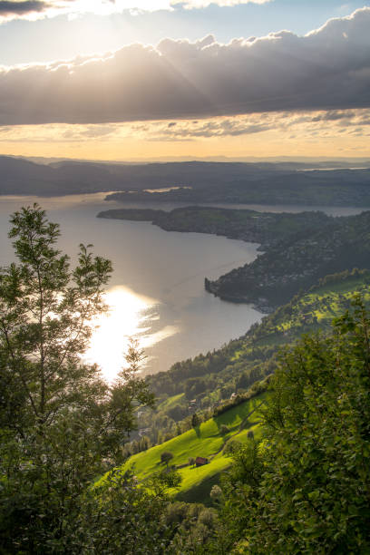 istock A lake from above, while the sun's rays break through the clouds 1470517798
