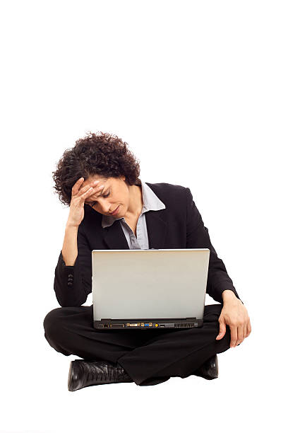Exhausted business woman stock photo