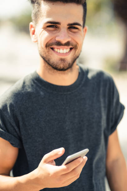 istock happiness young man on the phone 1470518266