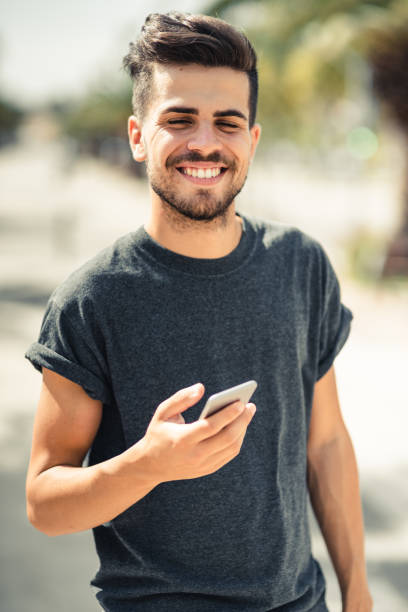 istock happiness young man on the phone 1470518466