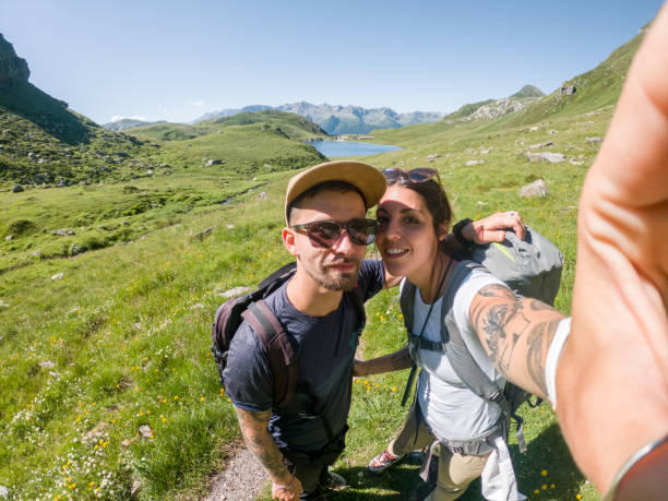 istock Couple hiking in summer and taking a selfie 1470518684