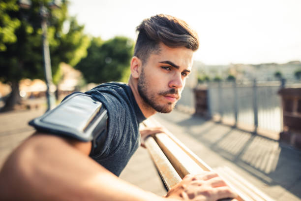 istock man doing stretching in the city 1470518772