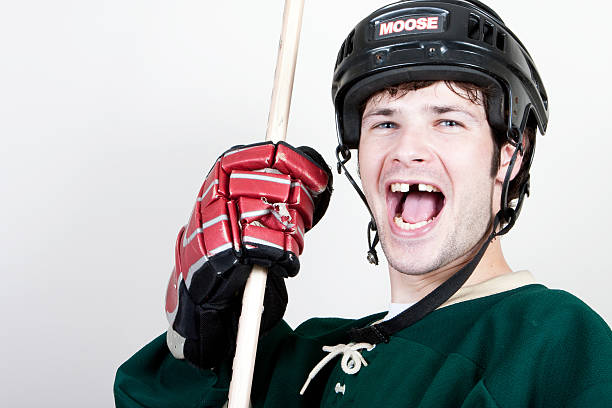 Goal celebration A Canadian hockey player celebrate after scoring a goal gap toothed photos stock pictures, royalty-free photos & images