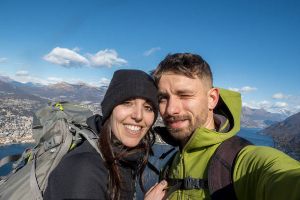 istock Couple hiking in winter and taking a selfie 1470520525