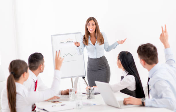 istock Businesswoman Giving Presentation 1470520921