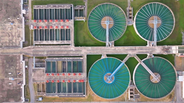 Aerial view of The Solid Contact Clarifier Tank type Sludge Recirculation in Water Treatment plant during sunrise