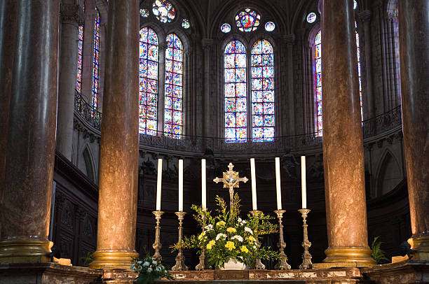 istock Catholic altar with the holy cross and candles 147052367