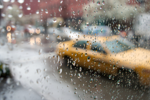 NYC taxi cab driving in the rain