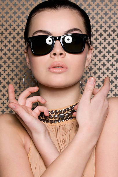istock Beautiful model wearing trendy sunglasses 147052810