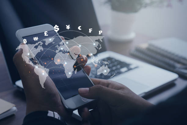 istock Currency exchange, money transfer.Businessman using mobile phone for digital banking, world currency via mobile app.FinTech financial technology, online banking, interbank payment, e-transaction concept. 1470533791
