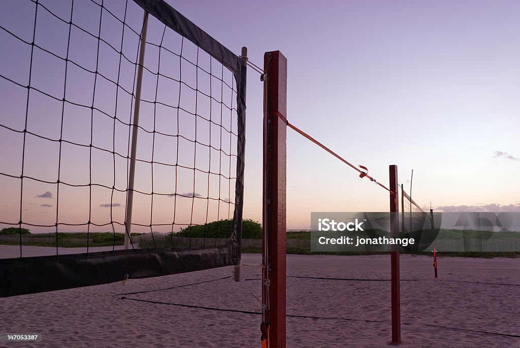 Beach volley reti - Foto stock royalty-free di Alba - Crepuscolo