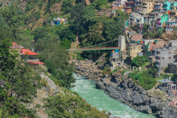 istock Bridge at Devprayag, Bhagirathi river from left side and Alakananda river from right side converge at Devprayag,Holy conflunece and form river Holy Ganges thereafter.Garhwal, Uttarakhand, India. 1470536900