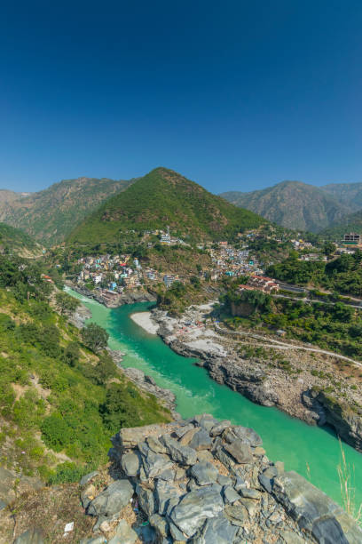 istock Bhagirathi river from left side and Alakananda river with turquoise blue colour from right side converge at Devprayag,Holy conflunece and form river Holy Ganges thereafter.Garhwal, Uttarakhand, India. 1470536982