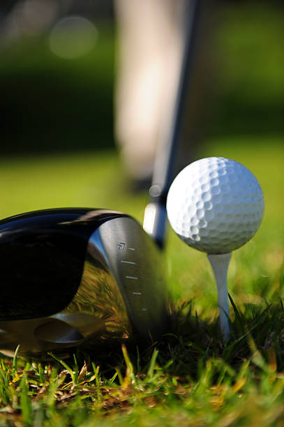 Golfer in action stock photo