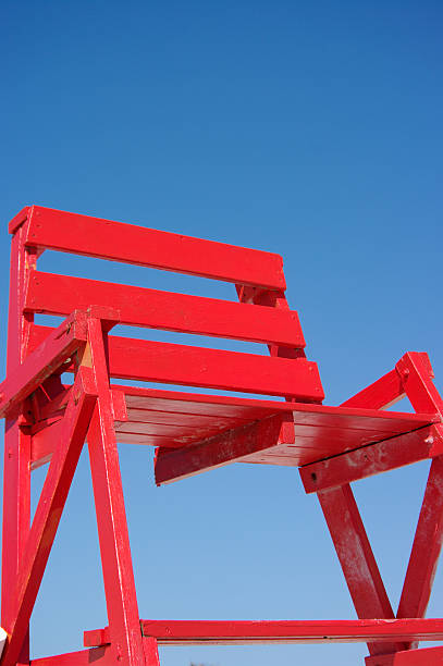 empty lifeguard chair stock photo