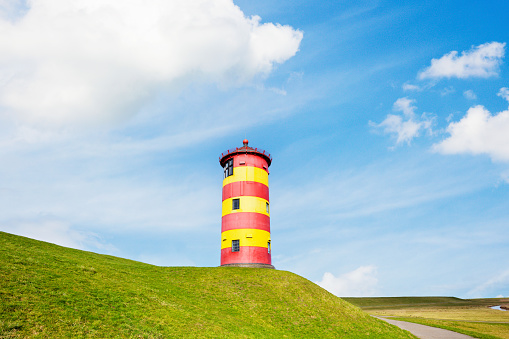 Lighthouse at Pilsum, North-Sea, East-Frisia. Lower Saxony, Germany