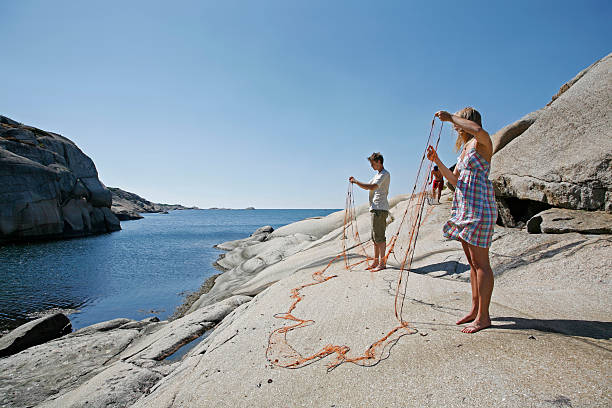 istock Making the fishing net ready as relaxation 147054170