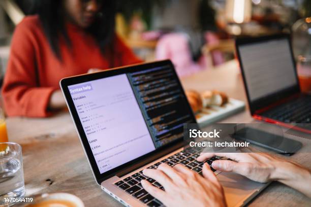 Female It Specialist Stock Photo - Download Image Now - Coding, Laptop, One Person