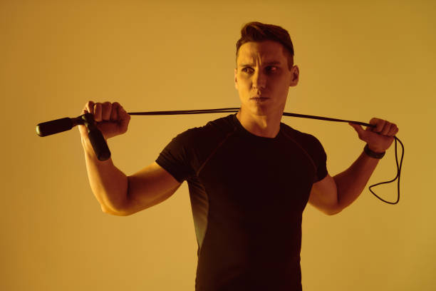 istock Athletic man with fit muscular body training in studio 1470545168