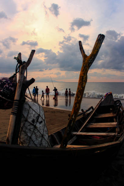 istock fishing on the beach 1470550370