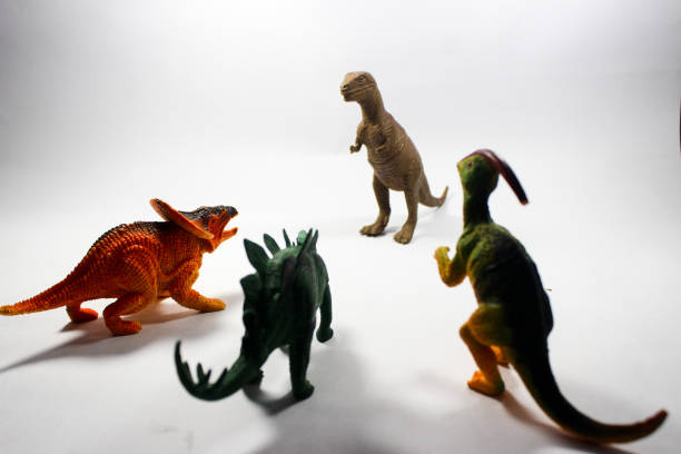 Dinosaur toys in a row