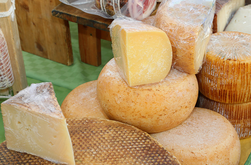 Seasoned cheeses made with sheep and cow s milk and goat for sale at the market