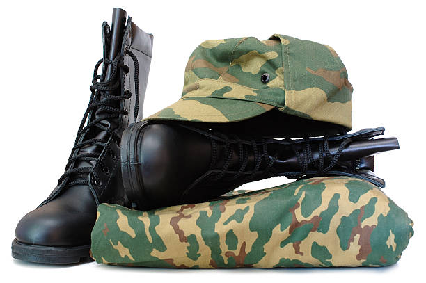 istock Camouflage army uniform with hat and boots 147055661