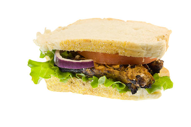 istock itialian bread grille chicken sandwich on white 147055851