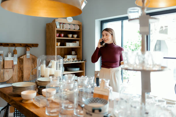 istock Saleswoman Talking on Mobile Phone 1470564355