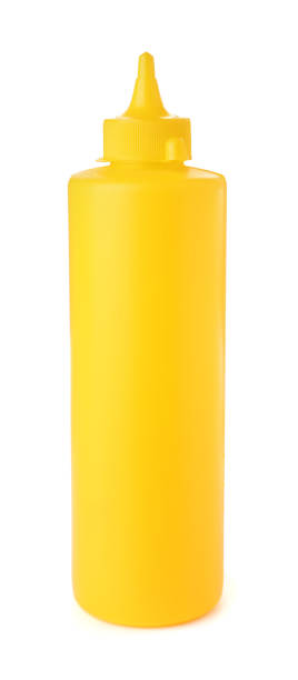 istock Plastic bottle of spicy mustard isolated on white 1470569091