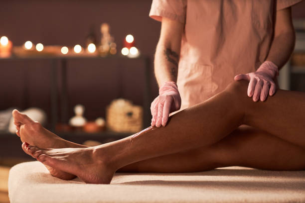 istock Esthetician Removing Body Hair 1470570754