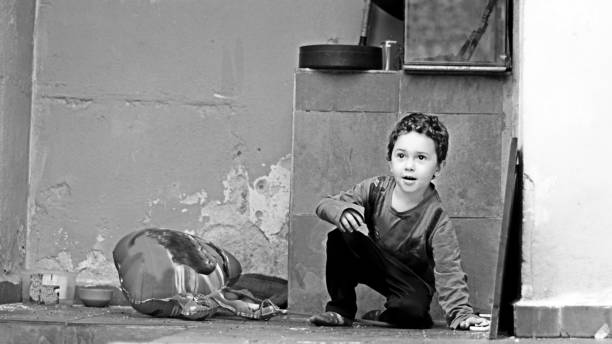 istock Boy Playing - House - City - Black And White 1470570944