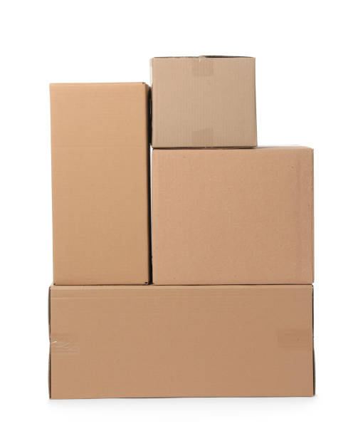 istock Many closed cardboard boxes on white background. Delivery service 1470571369