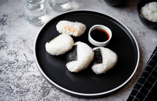 istock Onigiri, Japanese triangular rice balls stuffed with salmon 1470572587