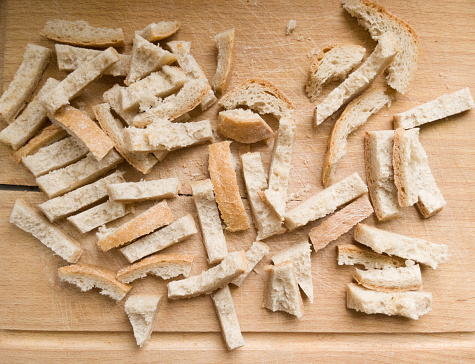 Small pieces of dried bread, close-up.