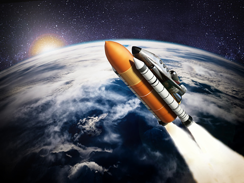 Rockets carrying futuristic space shuttles leaving the Earth's atmosphere, travelling to the outer space.