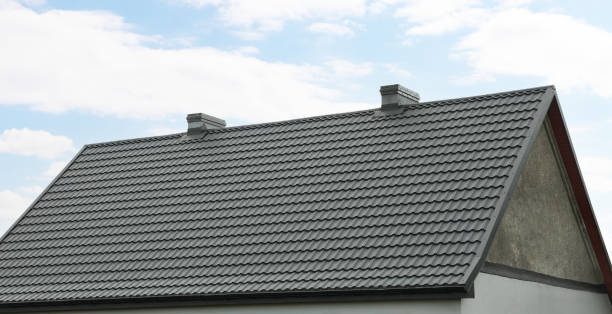 istock Modern building with grey roof outdoors on spring day 1470573929