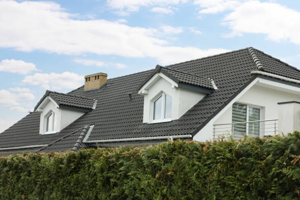 istock Modern building with grey roof outdoors on spring day 1470573954