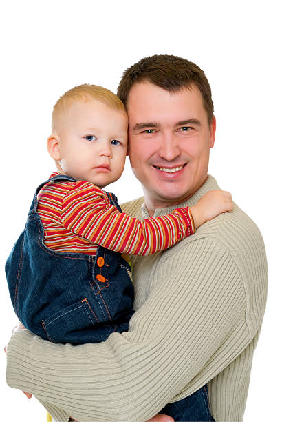 istock happy young father holding  hands on his little son 147057440