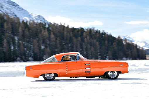 St.Moritz, Switzerland - February 25, 2023: A vehicle brand Lincoln Indianapolis Boano year 1955 Concept cars one-off drives a few show laps on the frozen
St. Moritzersee 