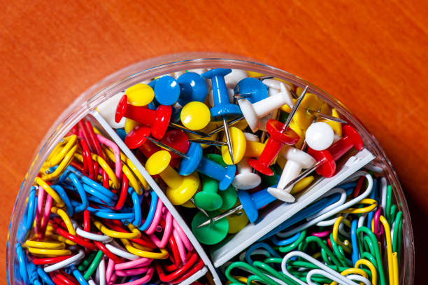 istock Thumbtacks and paper clips on the table 1470575651