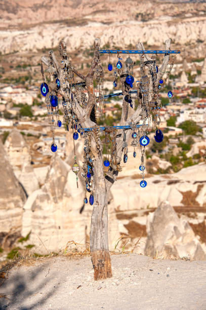 istock Evil eye beads hanging from a dry tree in Goreme town 1470576204