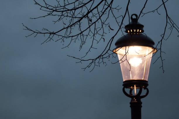 istock Low angle view of illuminated street light against sky 1470577853