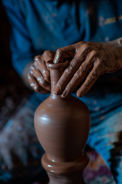 istock The clay master is about to finish the vase 1470579910