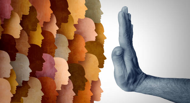 Anti-Immigration Symbol Anti-Immigration and migrant restriction or closing the border policy as a government hand stopping and restricting global diverse people from immigrating in a 3D illustration style. exclusive stock pictures, royalty-free photos & images