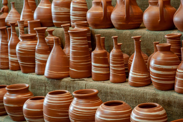 istock Brown and white striped vases on the stand - Diagonal view 1470582524