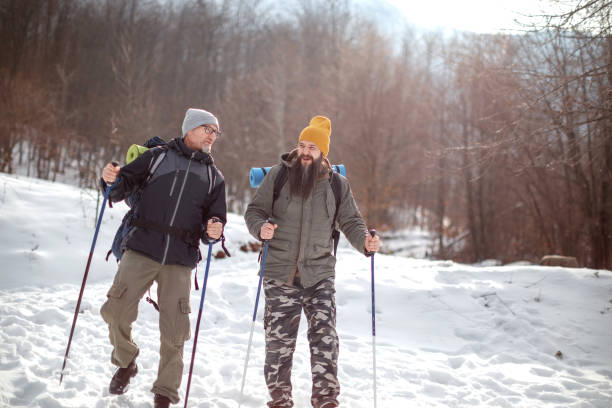 istock Two male friends hiking on snow 1470583787