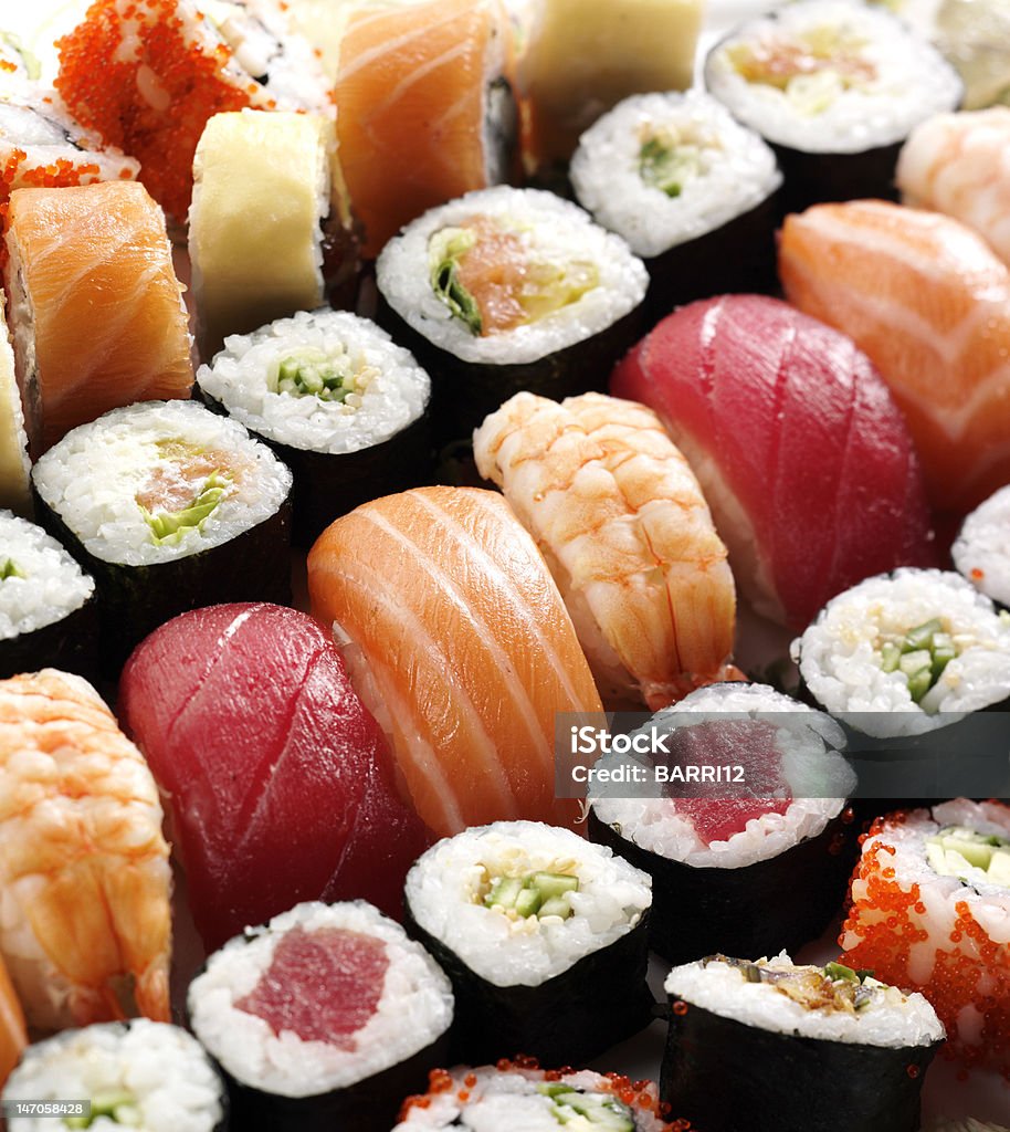 japanese sushi many tasty fresh japanese sushi with tuna, caviar and shrimp Appetizer Stock Photo
