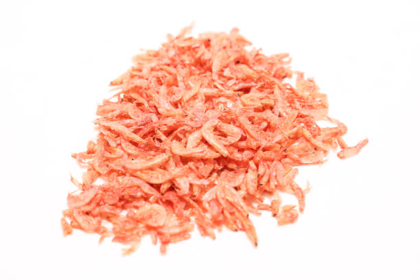 istock Small dried shrimp isolated on a white background. 1470584925