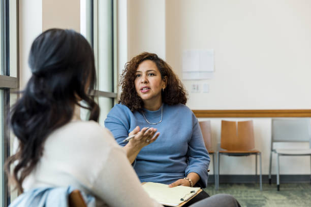 istock Female human resources manager talks with female employee 1470587686